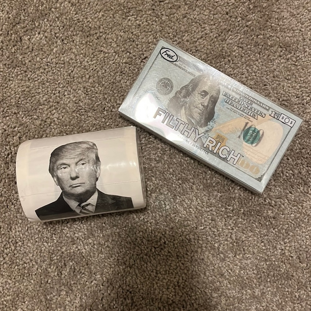 Gag gift. Trump toilet paper and money napkins